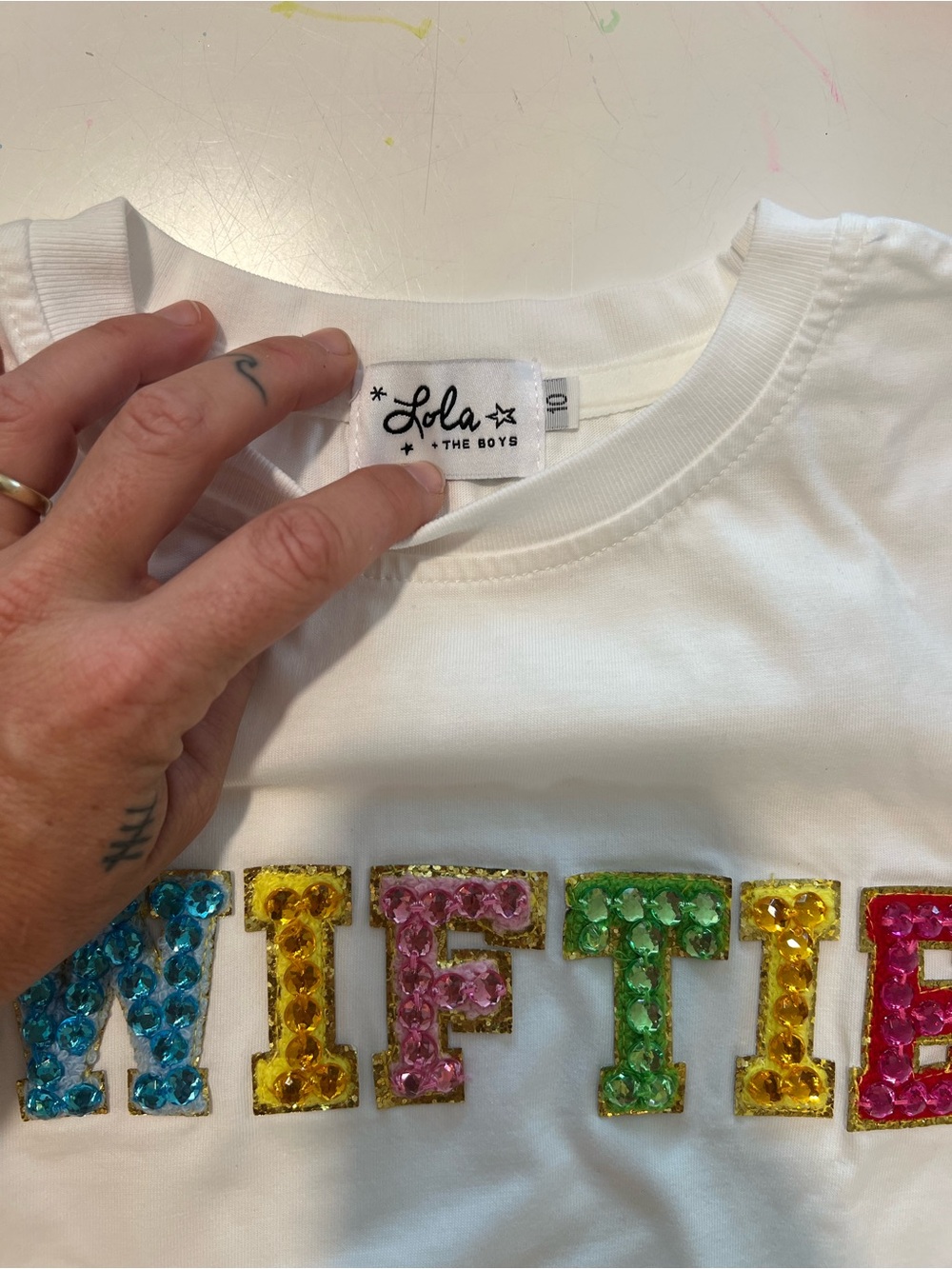 Lola + The Boys White Tee with Multicolor SWIFTIE Sequin Lettering